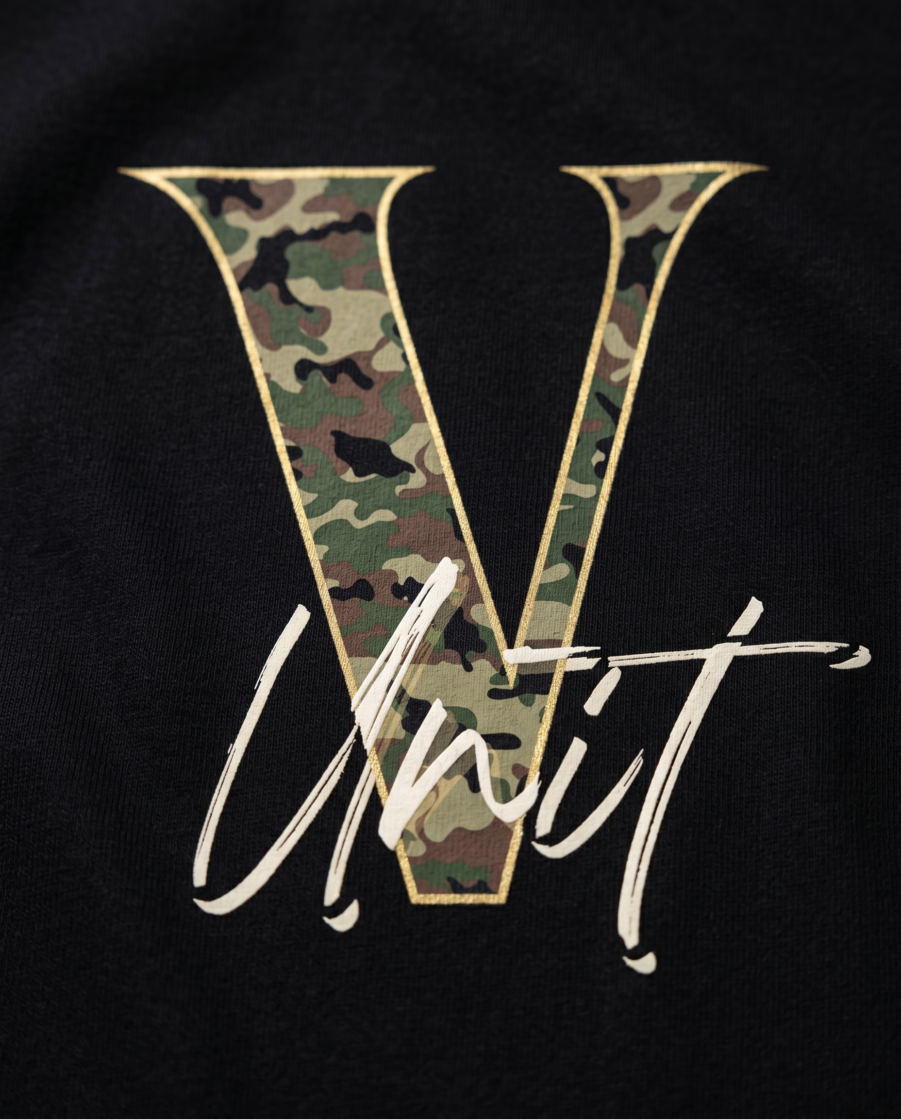 V-Unit camo design print close-up on black tee